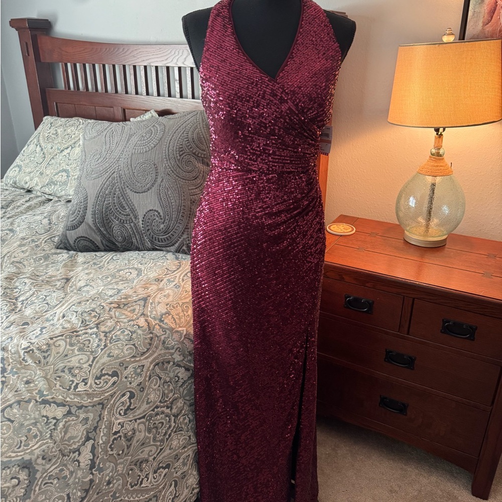 Elegant Burgundy Sequin Gown size 7. NWT.